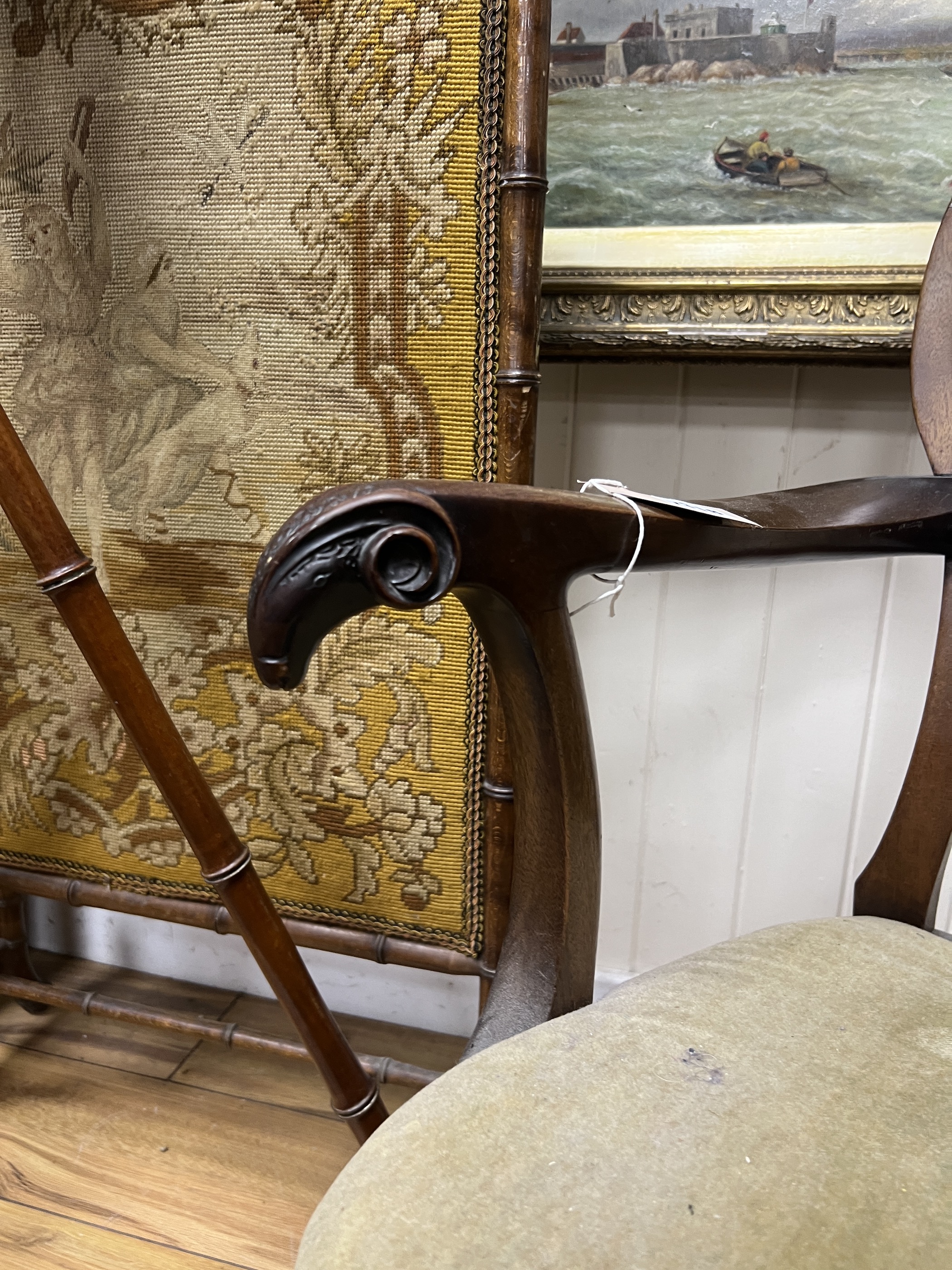 A small 18th century style mahogany open armchair with ram's head arms, width 64cm, height 80cm